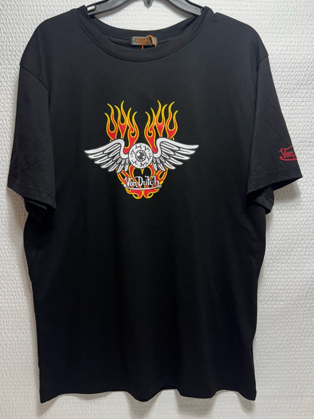 Von Dutch Black Tee with Yellow-Red Flame Wing Graphic
